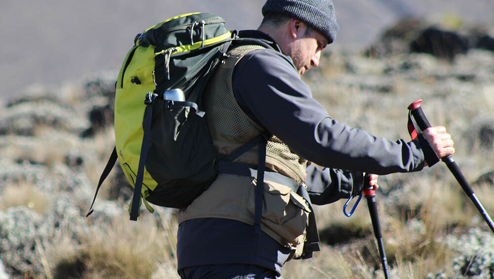 Hikers ascending the Umbwe Route on Mount Kilimanjaro through steep and scenic mountain terrain