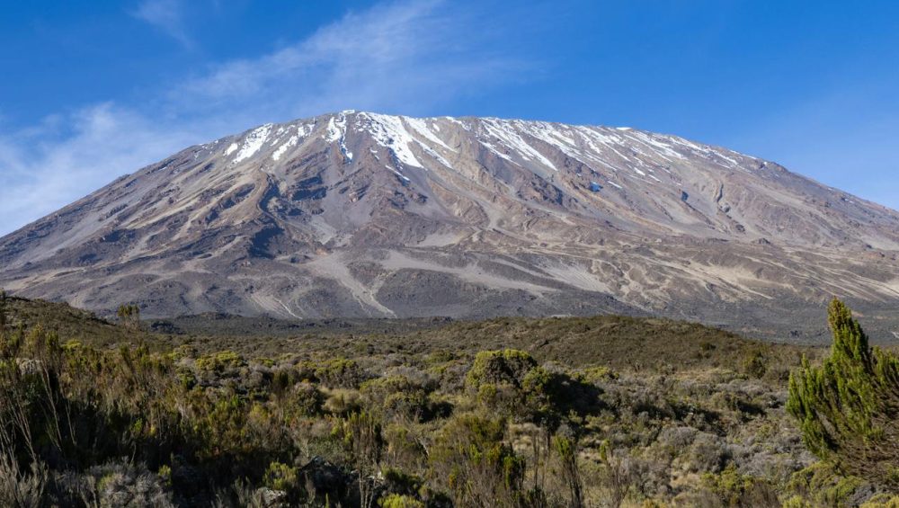 Mount Kilimanjaro view showing how hard it is to climb Mount Kilimanjaro with high-altitude mountain landscape