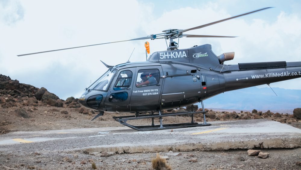 Kilimanjaro helicopter rescue operation helping a climber during an emergency on Mount Kilimanjaro