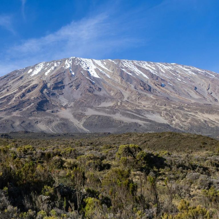 Mount Kilimanjaro volcanic cones showing Kibo Mawenzi and Shira eruption history landscape today