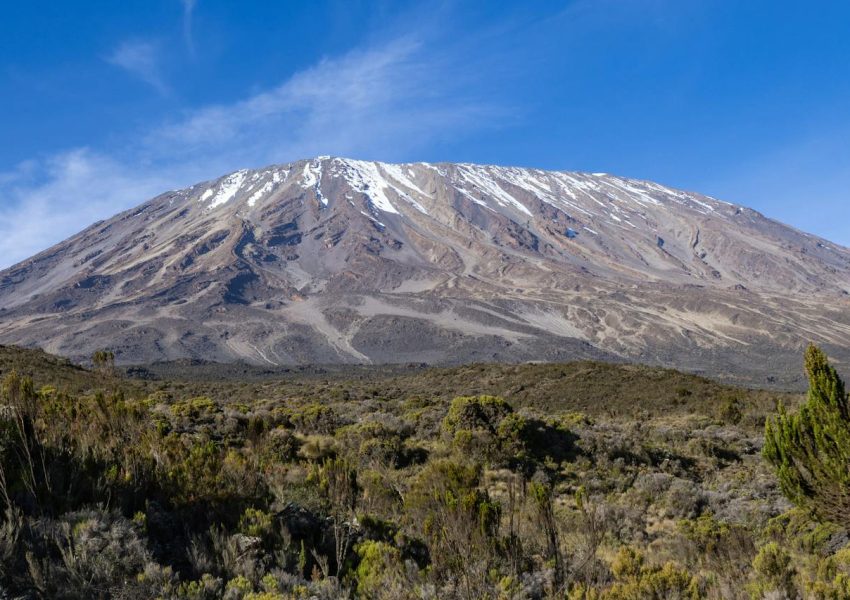 Mount Kilimanjaro volcanic cones showing Kibo Mawenzi and Shira eruption history landscape today