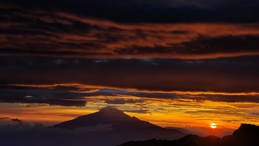 Panoramic view of the best mountains in Tanzania, featuring scenic hiking landscapes and iconic mountain peaks.