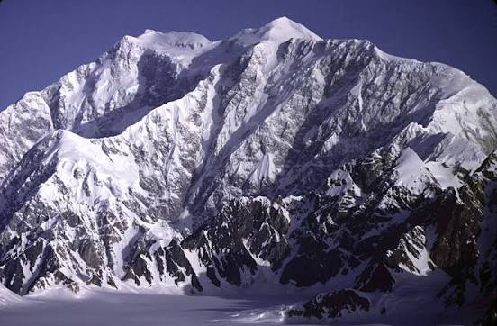 Mount Logan, the tallest mountain in Canada, covered with snow and glaciers in Yukon.