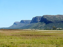 Waterberg Mountains in Limpopo, South Africa featuring ancient sandstone plateaus, rugged cliffs, and wide valleys covered with savanna vegetation.