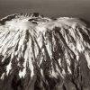 Kilimanjaro Crater Camp inside Kibo Crater surrounded by glaciers and volcanic rocks at high altitude