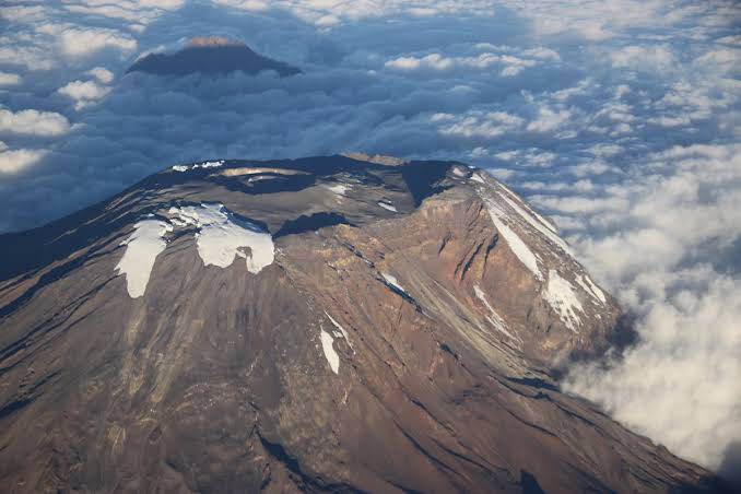 Hidden crater inside Mount Kilimanjaro showing volcanic summit landscape and inner geological formations