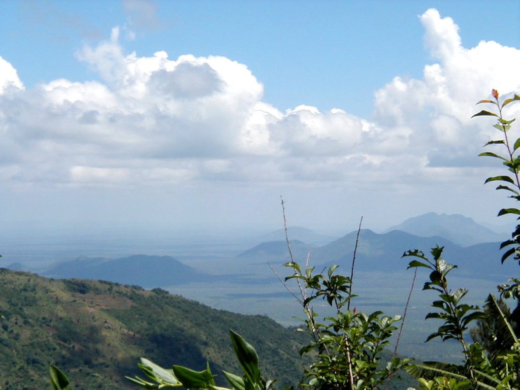 Pare Mountains in northern Tanzania with rolling green hills, farmland terraces, and scenic rural mountain landscapes.