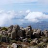 Climbers hiking the Rongai Route on Mount Kilimanjaro with scenic mountain views.