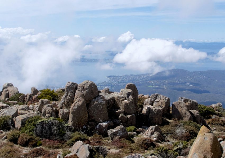 Climbers hiking the Rongai Route on Mount Kilimanjaro with scenic mountain views.