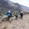 Scenic view of Mount Kilimanjaro rising above Tanzania's beautiful surrounding mountain landscape