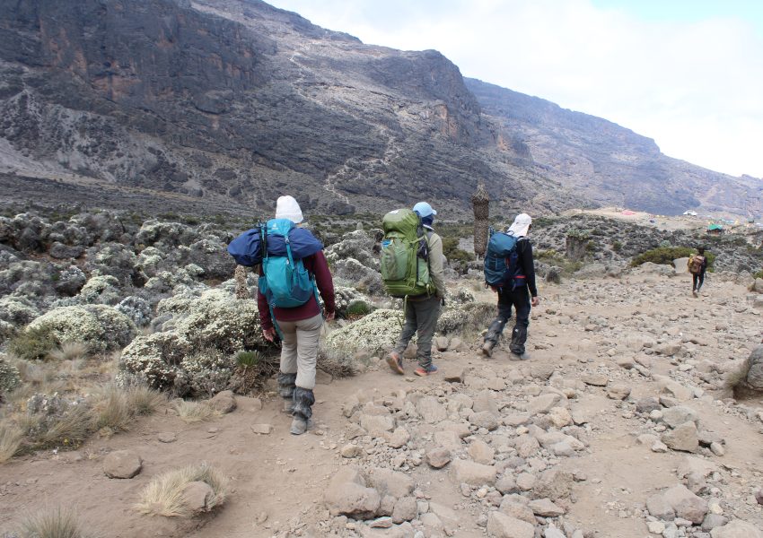 Scenic view of Mount Kilimanjaro rising above Tanzania's beautiful surrounding mountain landscape