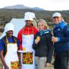 Client arrives at Kilimanjaro Shira Camp and enjoys fresh juice from the mountain crew.