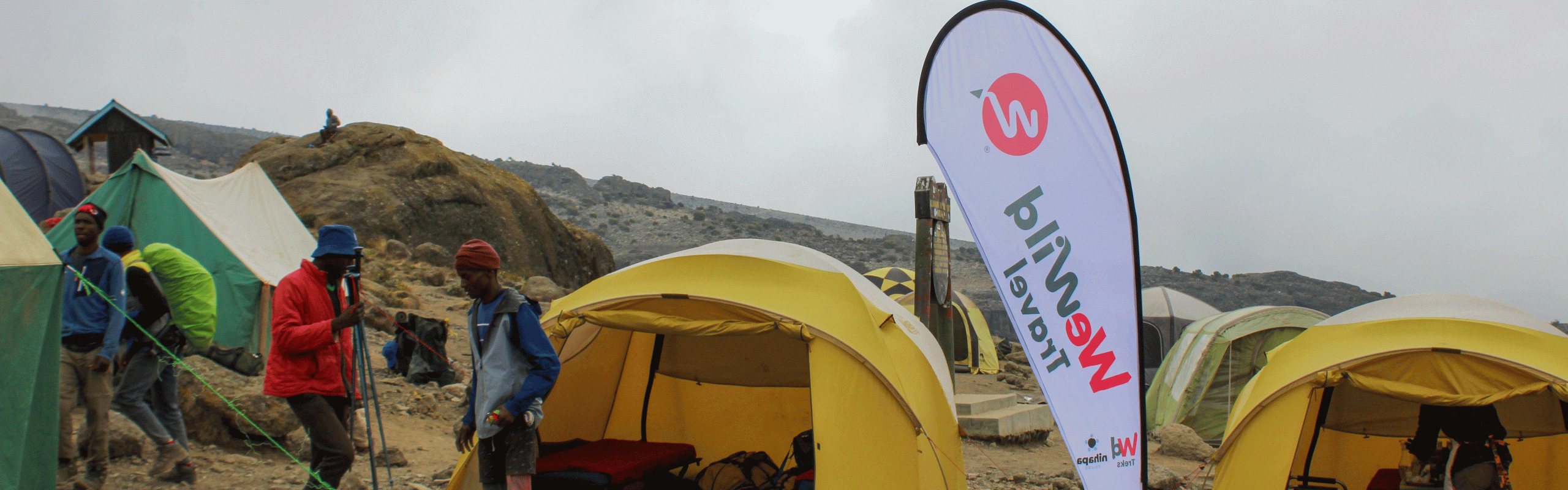 Trekkers hiking across the scenic Shira Plateau on the 6-day Lemosho Route during their Mount Kilimanjaro climb.