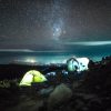 Full moon shining over Mount Kilimanjaro during a clear night summit climb in Tanzania