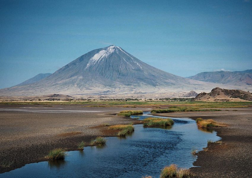Ol Doinyo Lengai, Tanzania’s sacred Mountain of God rising above the surrounding landscape.