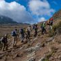Trekkers hiking the Machame Route on Mount Kilimanjaro during a scenic six-day trekking adventure.