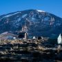 Climbers trekking Northern Circuit Route on Mount Kilimanjaro through scenic alpine desert landscape